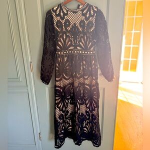 Gorgeous lace detail black dress.